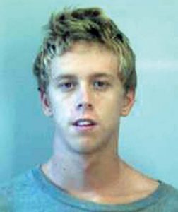 Officer: Partially handcuffed suspect punched him in face